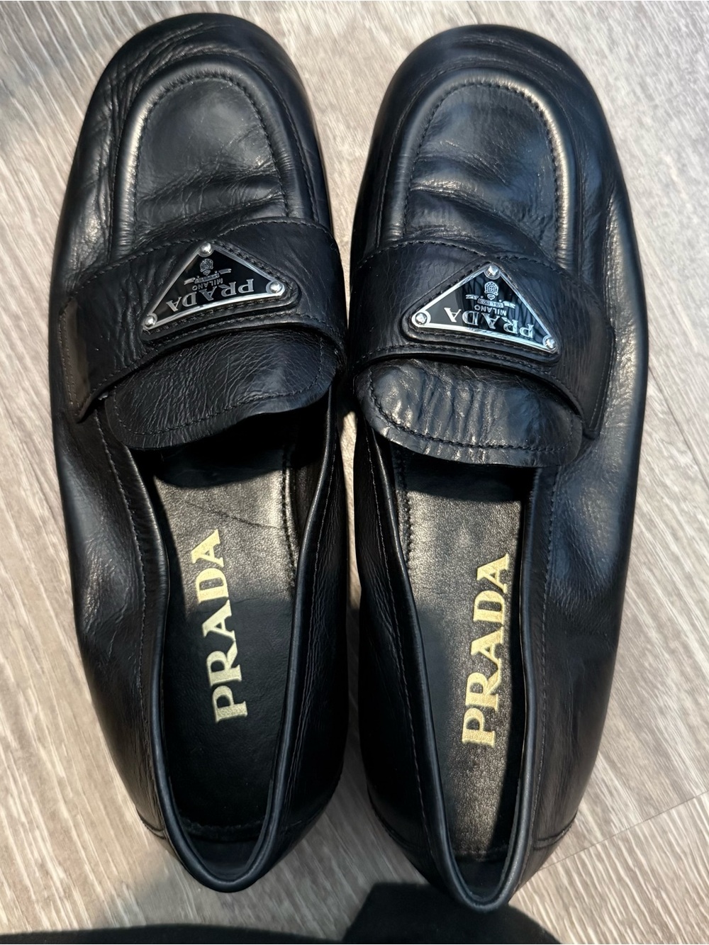 Prada Black Leather Penny Loafers with Logo Plaque